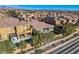 A high angle showing an outdoor living space and lush trees in a planned community at 4087 Villa Rafael Dr, Las Vegas, NV 89141