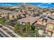 A high angle shows desert landscaping in this community with a mountain backdrop at 4087 Villa Rafael Dr, Las Vegas, NV 89141