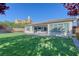 Beautiful backyard with a covered patio, perfect for outdoor entertaining and relaxation at 4087 Villa Rafael Dr, Las Vegas, NV 89141