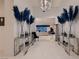 Inviting foyer with stylish vases, modern tables, and an open view to the living area at 4087 Villa Rafael Dr, Las Vegas, NV 89141