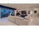 Bright and airy living room featuring modern decor and a serene outdoor view at 4087 Villa Rafael Dr, Las Vegas, NV 89141