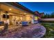 Inviting outdoor patio area with comfortable seating, ideal for relaxing and entertaining guests at 4087 Villa Rafael Dr, Las Vegas, NV 89141