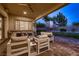 Covered patio with comfortable seating, ideal for entertaining and enjoying the outdoors at 4087 Villa Rafael Dr, Las Vegas, NV 89141