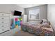Charming bedroom features a colorful decor and a comfortable bed at 4371 Fire Glow Ave, North Las Vegas, NV 89084