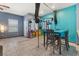 Dining area with tile floors, gray trim, and abundant natural light at 4371 Fire Glow Ave, North Las Vegas, NV 89084