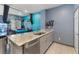 Kitchen with granite countertops, stainless appliances, tile floors, and an open layout at 4371 Fire Glow Ave, North Las Vegas, NV 89084
