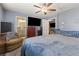 Spacious main bedroom with ample closet space, neutral tones, and views to the en-suite at 4371 Fire Glow Ave, North Las Vegas, NV 89084