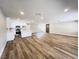 Spacious living room with recessed lighting and open floor plan leading to the kitchen at 4485 Greenhill Dr, Las Vegas, NV 89121