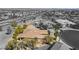 A black and white aerial view of a single Gathering home with mature trees, desert landscaping and a tile roof at 4963 Pensier St, Las Vegas, NV 89135