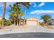 Charming single story home with low maintenance desert landscaping and a two car garage at 4963 Pensier St, Las Vegas, NV 89135