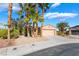 Charming single story home featuring low maintenance desert landscaping and an attached two car garage at 4963 Pensier St, Las Vegas, NV 89135
