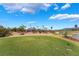 Picturesque view of the golf course with blue skies and green fairways at 4963 Pensier St, Las Vegas, NV 89135