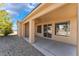 Spacious covered patio with concrete flooring, seamlessly blending indoor and outdoor living at 4963 Pensier St, Las Vegas, NV 89135