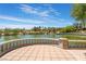 Lakeside patio overlooking a tranquil pond with lush vegetation at 4963 Pensier St, Las Vegas, NV 89135