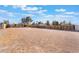 Large, fenced yard ideal for desert landscaping and outdoor activities at 4970 E Van Buren Ave, Las Vegas, NV 89110