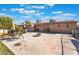 Cozy backyard featuring a patio area with seating, ideal for outdoor dining and relaxation with a fire pit at 4970 E Van Buren Ave, Las Vegas, NV 89110
