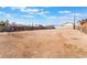 Over-sized lot with fence and desert landscaping at 4970 E Van Buren Ave, Las Vegas, NV 89110