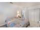 Comfortable bedroom with an exterior view and a neutral color scheme at 4970 E Van Buren Ave, Las Vegas, NV 89110