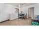Dining area features a table and chairs with natural light, adjacent to the kitchen and living spaces at 4970 E Van Buren Ave, Las Vegas, NV 89110