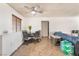 Dining area features a table and chairs with natural light, adjacent to the kitchen and living spaces at 4970 E Van Buren Ave, Las Vegas, NV 89110