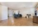 Open-concept living room with tile flooring, neutral walls, and ample space for furniture and decor at 4970 E Van Buren Ave, Las Vegas, NV 89110