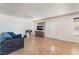 Bright living room featuring tile floors, neutral walls, and a window for natural light, creating a welcoming space at 4970 E Van Buren Ave, Las Vegas, NV 89110