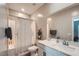 Neutral bathroom with a single sink vanity and a shower-tub combination at 524 Teovani St # 826, Henderson, NV 89052