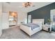 Inviting bedroom with a luxurious bed, side tables, and serene lighting at 524 Teovani St # 826, Henderson, NV 89052