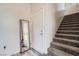 Entryway features a mirrored wall and stairway that leads to the upper level at 524 Teovani St # 826, Henderson, NV 89052