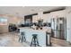 Contemporary kitchen featuring stainless steel appliances, modern cabinetry, and a kitchen island at 524 Teovani St # 826, Henderson, NV 89052