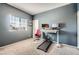 Home office with a standing desk, dual monitors, and a sleek, modern design at 524 Teovani St # 826, Henderson, NV 89052