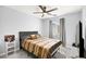 Neutral bedroom design with a ceiling fan and comfortable bed at 528 Thistleberry Ave, Henderson, NV 89044