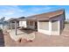 Spacious backyard with a covered patio, above ground pool and low-maintenance desert landscaping at 531 Coolidge Ave, Henderson, NV 89015