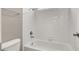 Bathroom showing shower, toilet and white tile surround at 531 Coolidge Ave, Henderson, NV 89015