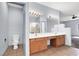 Bathroom boasts a spacious double sink vanity with lots of storage and tiled floors at 531 Coolidge Ave, Henderson, NV 89015
