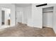Neutral bedroom features a closet and a bathroom nearby at 531 Coolidge Ave, Henderson, NV 89015