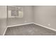 Cozy bedroom with neutral walls, carpet flooring, and a window allowing natural light at 531 Coolidge Ave, Henderson, NV 89015