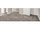 Expansive bedroom with neutral paint and carpet, showing ample space and multiple doorways at 531 Coolidge Ave, Henderson, NV 89015