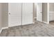 Bedroom showing carpeting, closet and a view of additional living space at 531 Coolidge Ave, Henderson, NV 89015