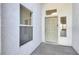 Inviting entryway featuring a well-maintained front door, side windows, and stucco wall at 531 Coolidge Ave, Henderson, NV 89015