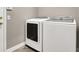 Functional laundry room featuring a side-by-side washer and dryer set at 531 Coolidge Ave, Henderson, NV 89015