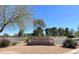 View of Burkholder Park entrance with landscaping and trees under a clear blue sky at 531 Coolidge Ave, Henderson, NV 89015