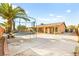 Expansive backyard with a trampoline, covered patio, and ample space for outdoor activities and gatherings at 5717 Christchurch Ave, Las Vegas, NV 89110