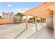 A covered patio and trampoline overlook the pool in this home's backyard at 5717 Christchurch Ave, Las Vegas, NV 89110