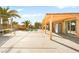 Spacious backyard featuring a pool, covered patio, and a trampoline, perfect for outdoor enjoyment at 5717 Christchurch Ave, Las Vegas, NV 89110