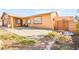 Charming single-story house with desert landscaping and a cozy front porch at 5717 Christchurch Ave, Las Vegas, NV 89110