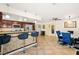 Open-concept living space with a view of the kitchen and a formal dining area at 5717 Christchurch Ave, Las Vegas, NV 89110
