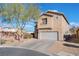 Charming stucco home with a two-car garage and well-maintained landscaping in a desirable neighborhood at 6552 Casamar St, North Las Vegas, NV 89086