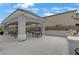 Outdoor seating with covered BBQ area in a community gathering space perfect for social events at 7122 Red Gulch St, North Las Vegas, NV 89084
