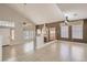 Inviting living room with vaulted ceilings, fireplace, and large windows providing natural light at 7228 Buglehorn St, Las Vegas, NV 89131